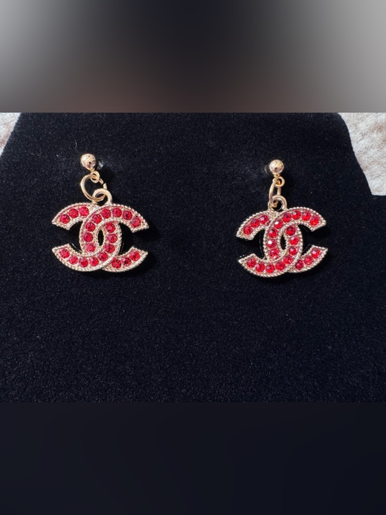 CHANEL Jewelry - CHANEL Gold-Tone Interlocking CC Drop Earrings with Red Crystals